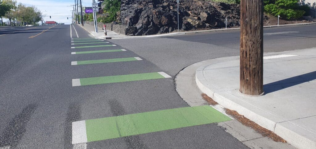 Buffered Bike Lane on Howard Street. A bike lane with an extra white line to keep vehicle traffic even further away.