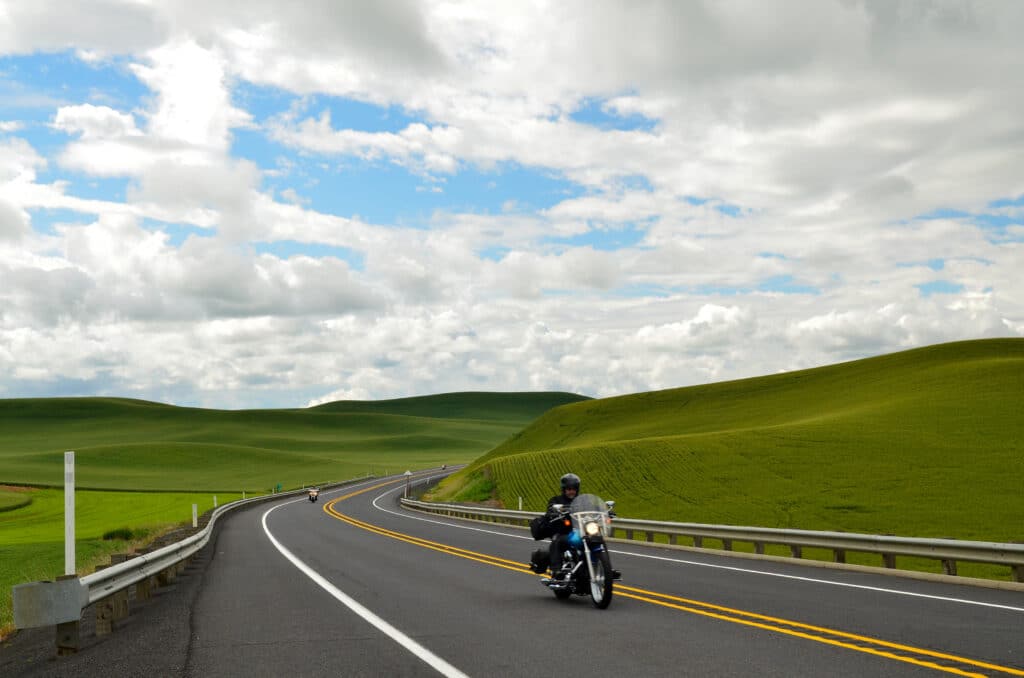 Motorcyclists on highway in Eastern Washington.