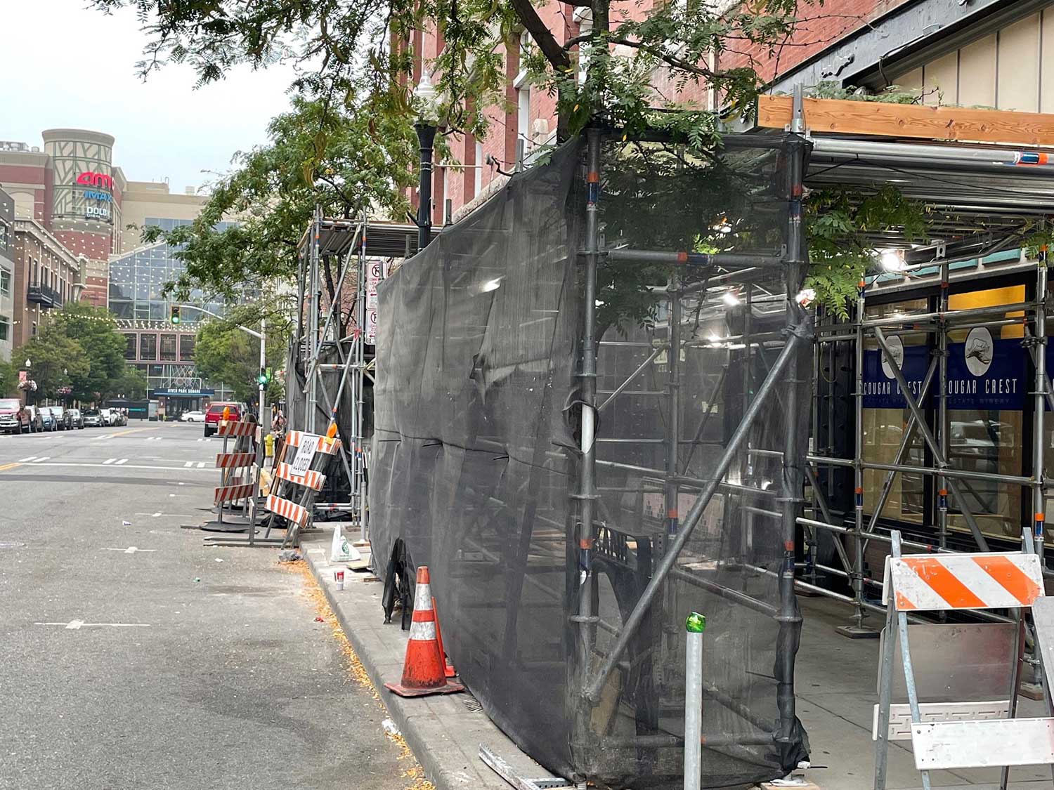 A construction project blocks a sidewalk along Post Street, near Sprague Avenue, in Downtown Spokane,
