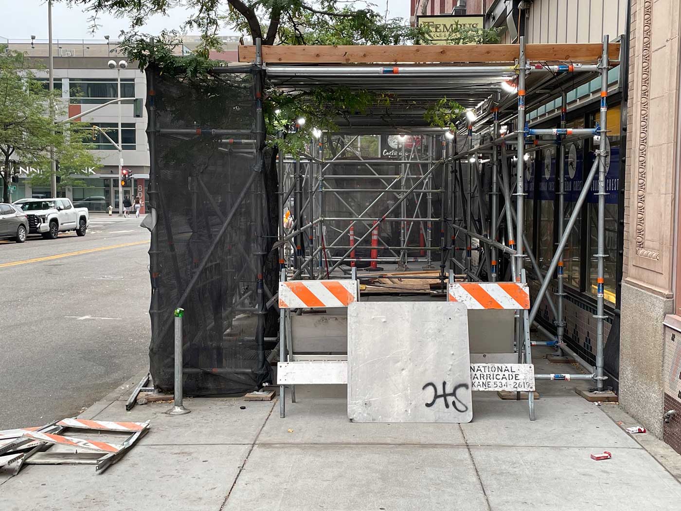 A sidewalk completely shut down by a restoration project along Post Street in Downtown Spokane.